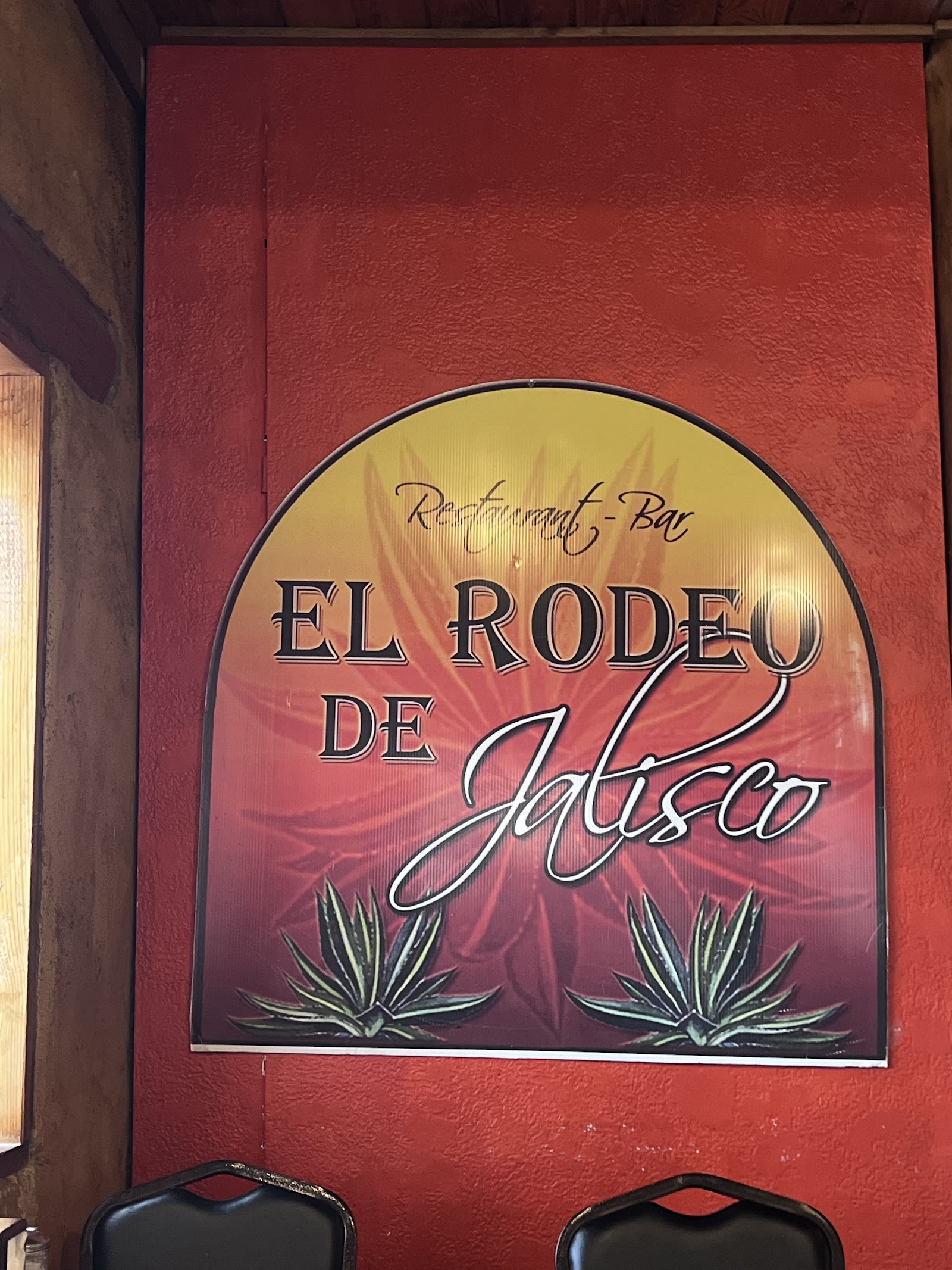 El Rodeo De Jalisco restaurant and bar sign with agave artwork inside the dining room