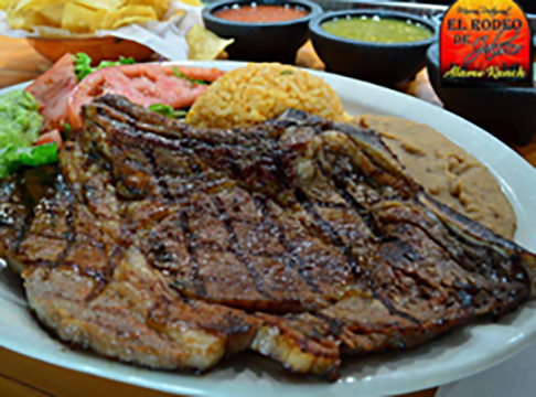 Char-grilled T-bone steak plate with rice, beans and fresh tortillas